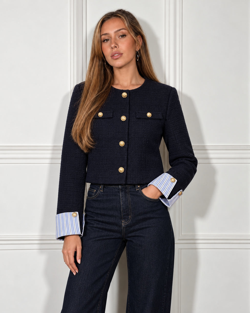 Cropped textured jacket in navy, worn by a model with dark jeans
