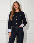 Cropped textured jacket in navy, worn by a model with dark jeans