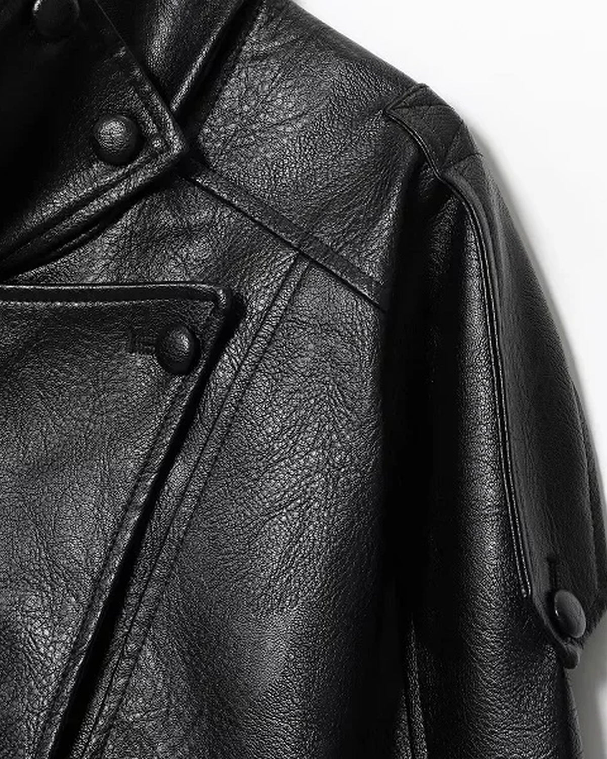 Cropped leather moto jacket in black, collar and snap detail