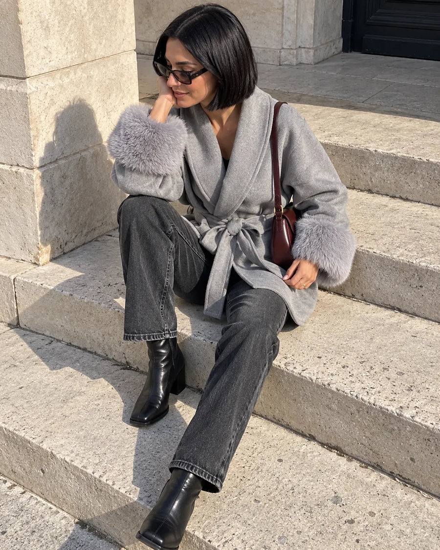 @lea.moret wearing the grey belted shawl-collar coat